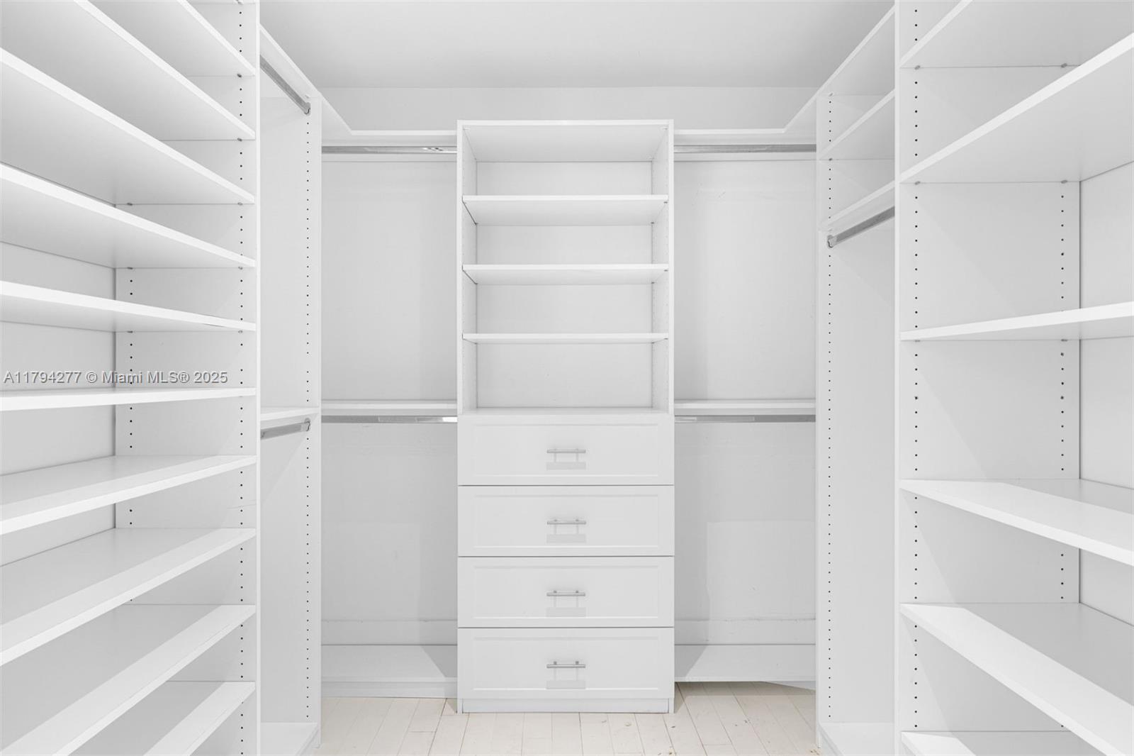 712 Northeast 72nd Street Miami, FL 33138 - Photo 25 of 35 a view of walk in closet