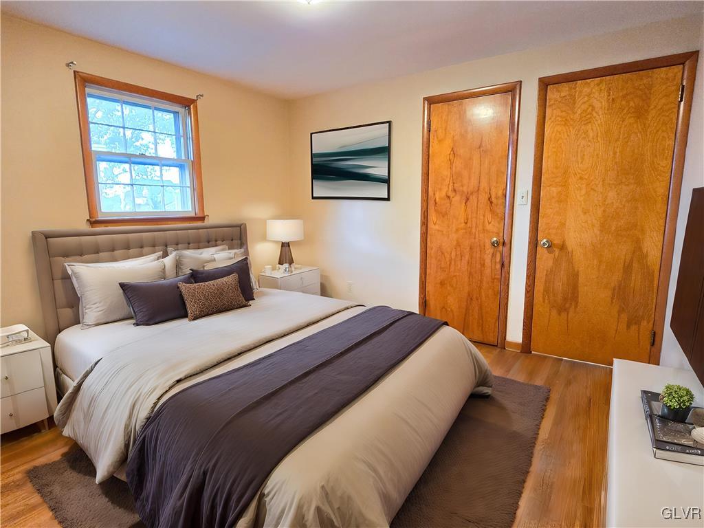 407 Cherry Hill Road Nazareth, PA 18064 - Photo 11 of 45 a bedroom with a bed and a window