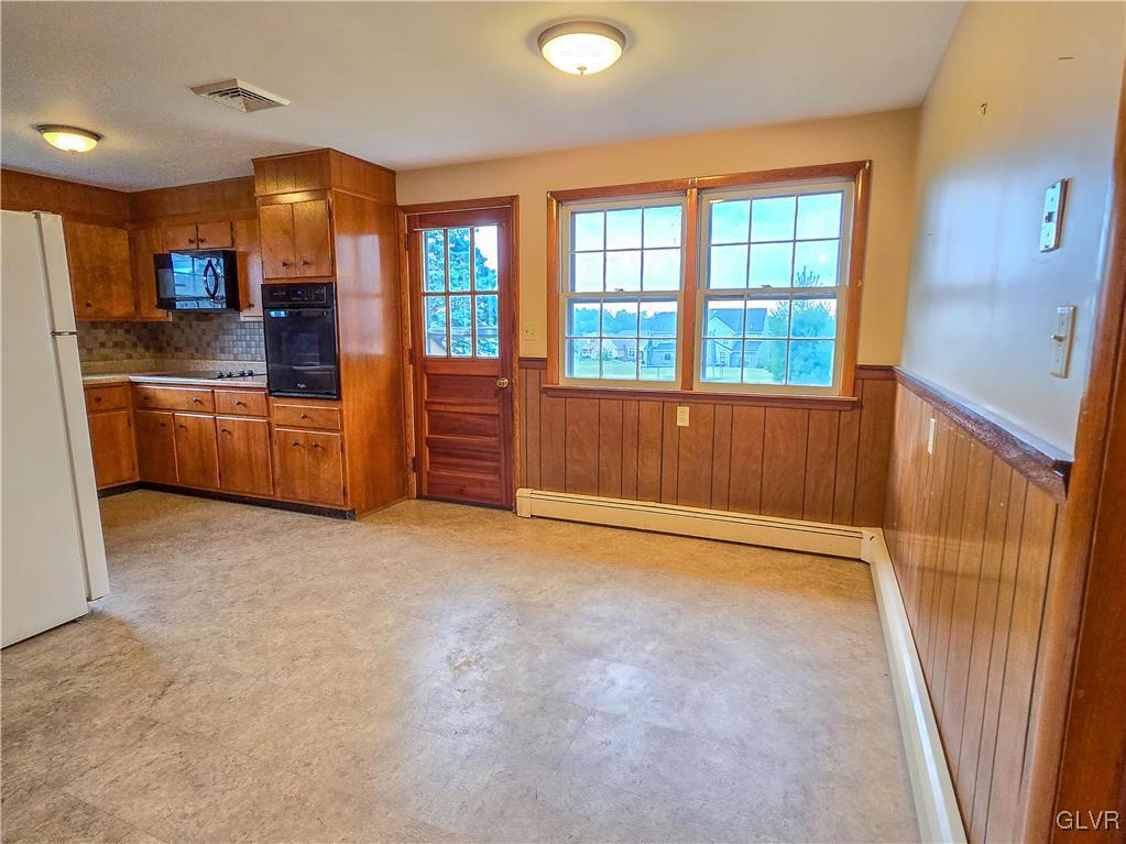 407 Cherry Hill Road Nazareth, PA 18064 - Photo 27 of 45 a view of an empty room with a kitchen