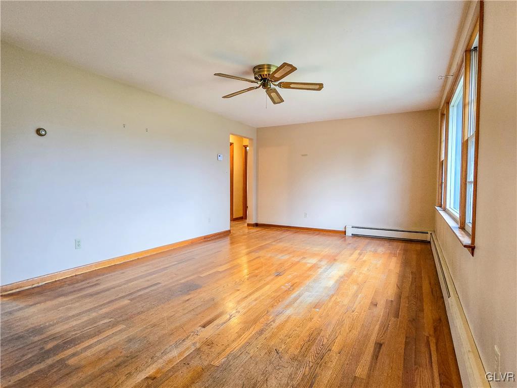 407 Cherry Hill Road Nazareth, PA 18064 - Photo 30 of 45 a view of a room with wooden floor and window