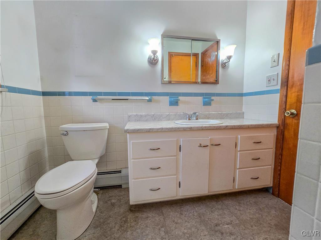 407 Cherry Hill Road Nazareth, PA 18064 - Photo 31 of 45 a bathroom with a toilet sink and mirror