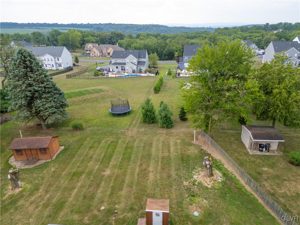 407 Cherry Hill Road Nazareth, PA 18064 - Photo 35 of 45 a view of a swimming pool with a yard
