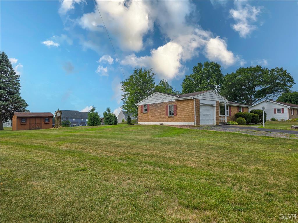 407 Cherry Hill Road Nazareth, PA 18064 - Photo 6 of 45 a front view of a house with garden