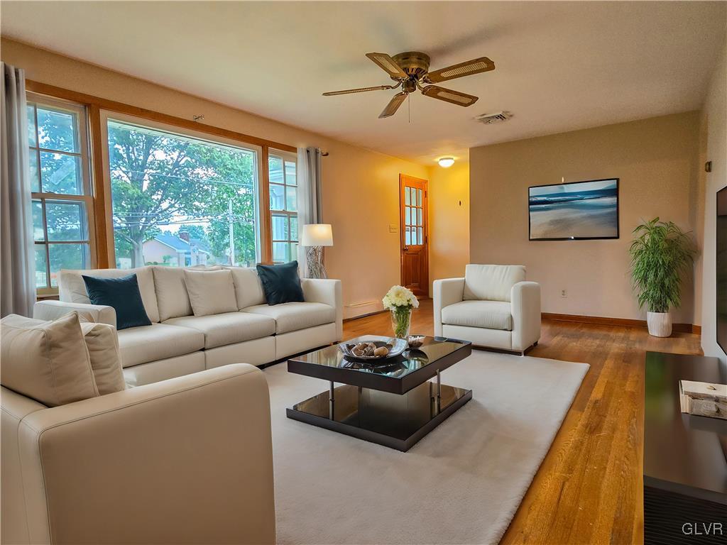 407 Cherry Hill Road Nazareth, PA 18064 - Photo 8 of 45 a living room with furniture and a large window