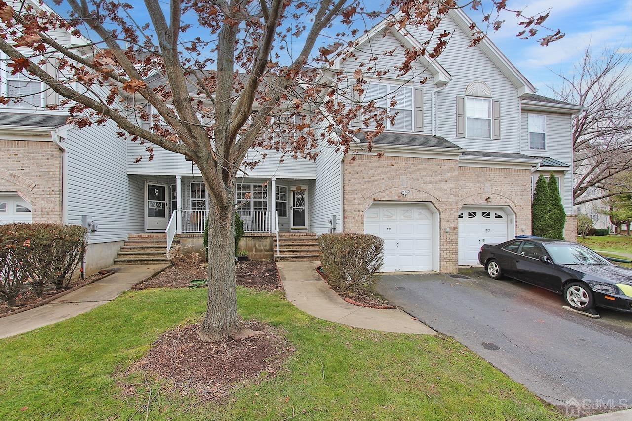 a house view with a garden space
