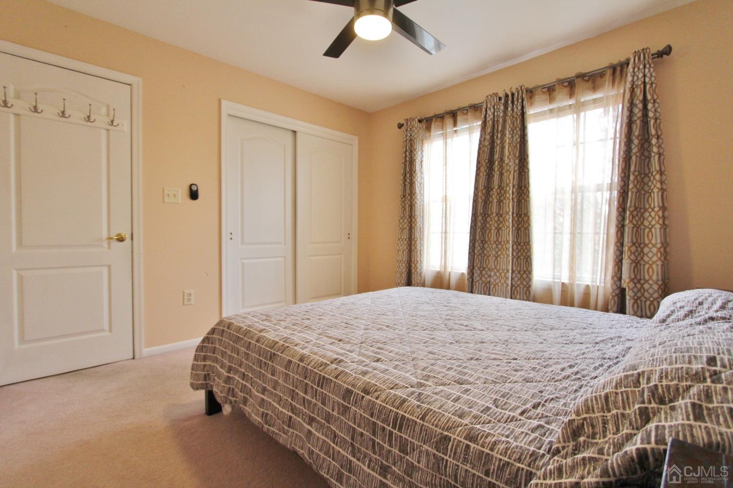 323 Hawthorne Road North Brunswick, NJ 08902 - Photo 18 of 29 a bedroom with a bed and window