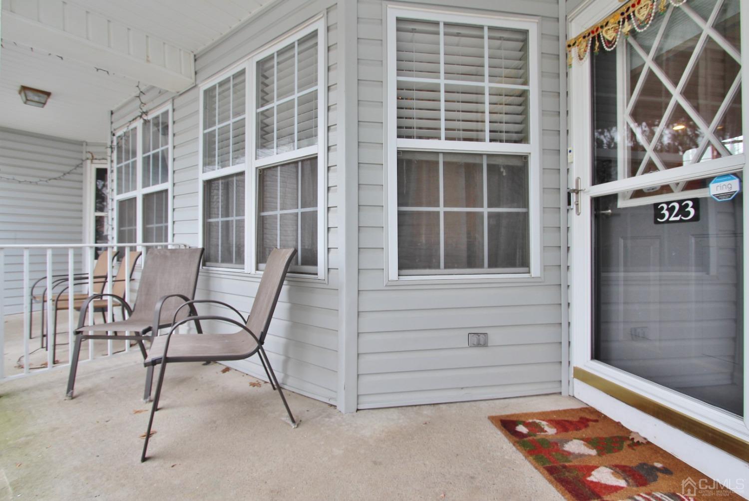323 Hawthorne Road North Brunswick, NJ 08902 - Photo 2 of 29 a view of house with outdoor space and porch
