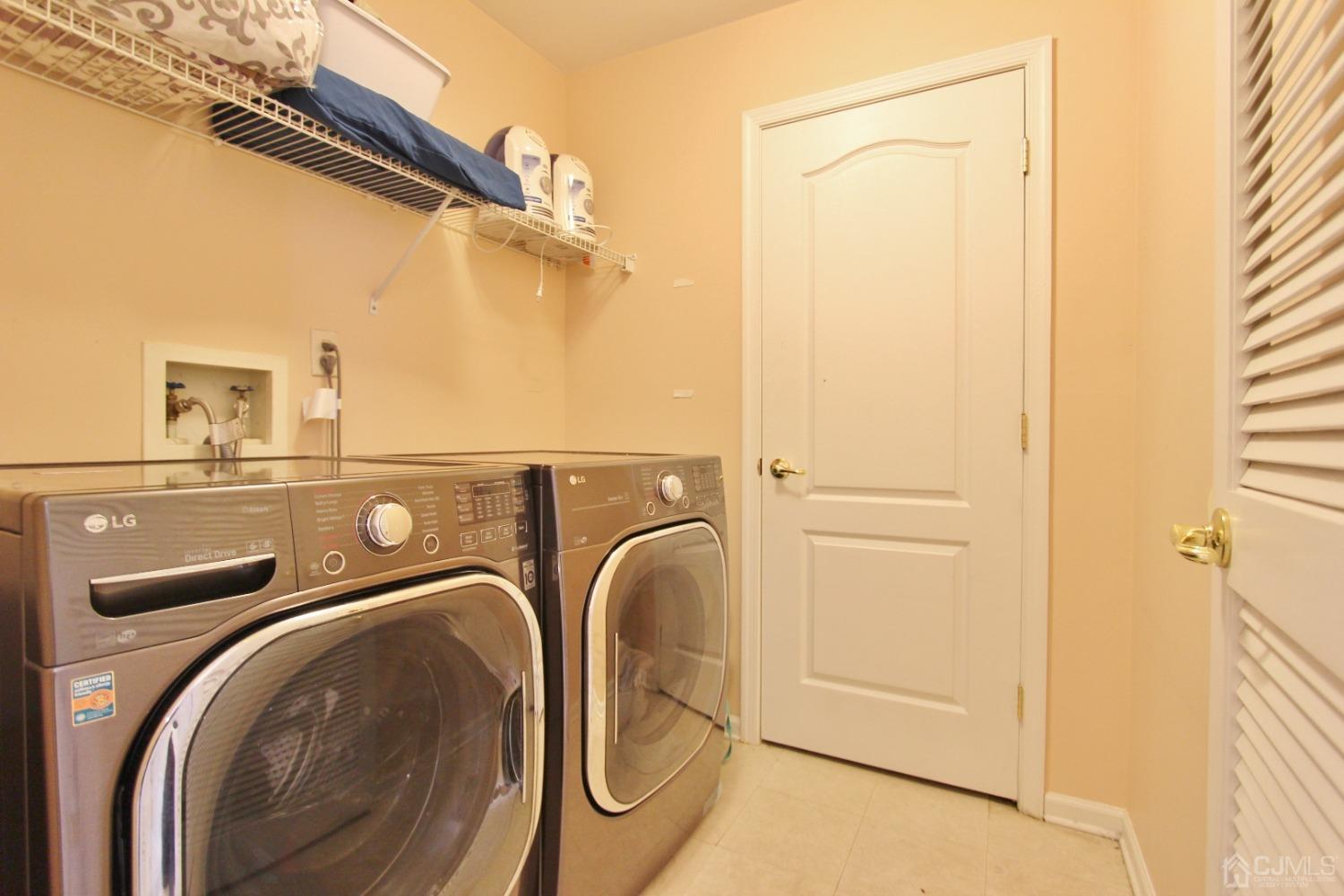 323 Hawthorne Road North Brunswick, NJ 08902 - Photo 21 of 29 a utility room with dryer and washer