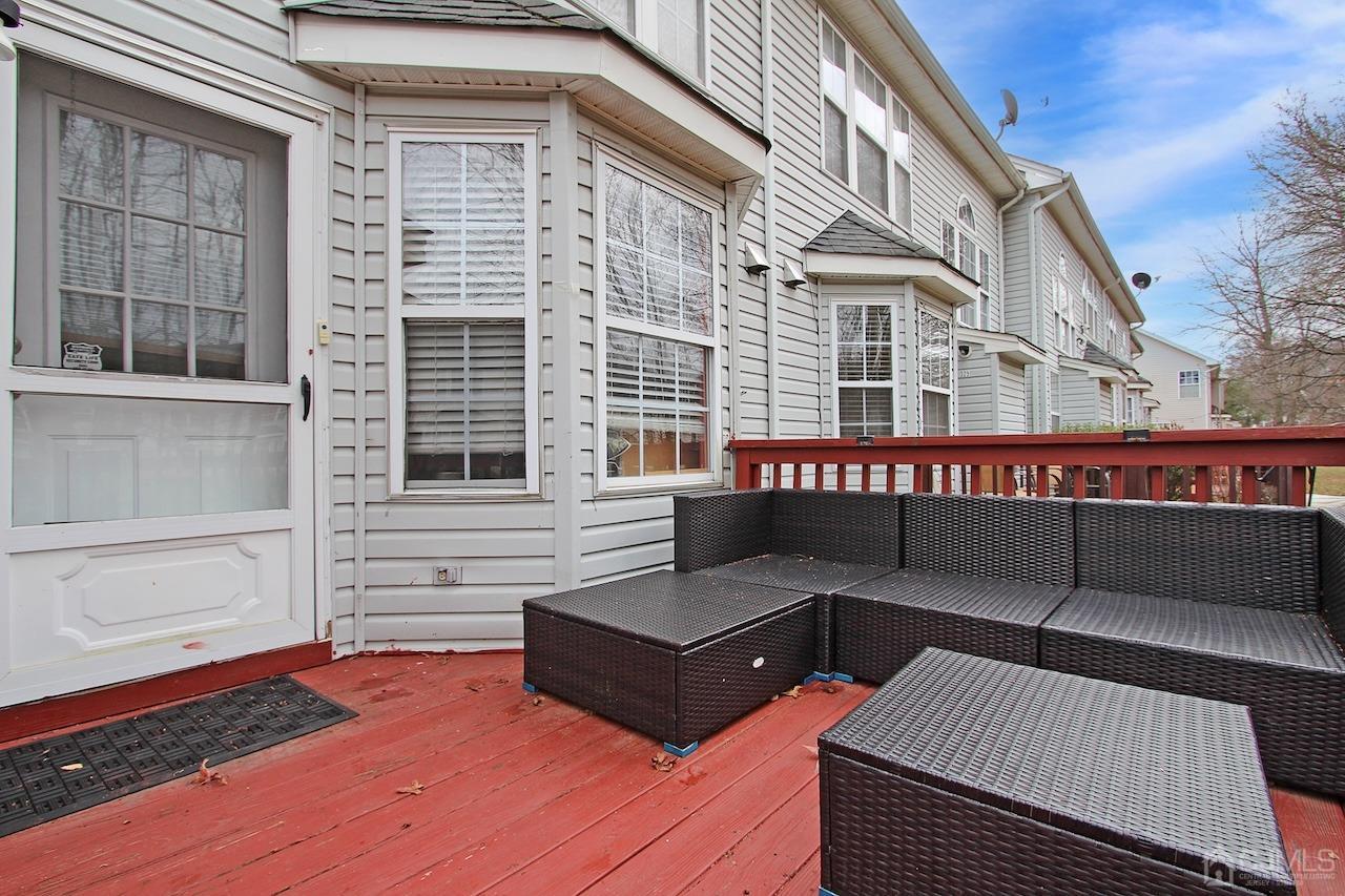 323 Hawthorne Road North Brunswick, NJ 08902 - Photo 27 of 29 a view of a building with couches in the patio