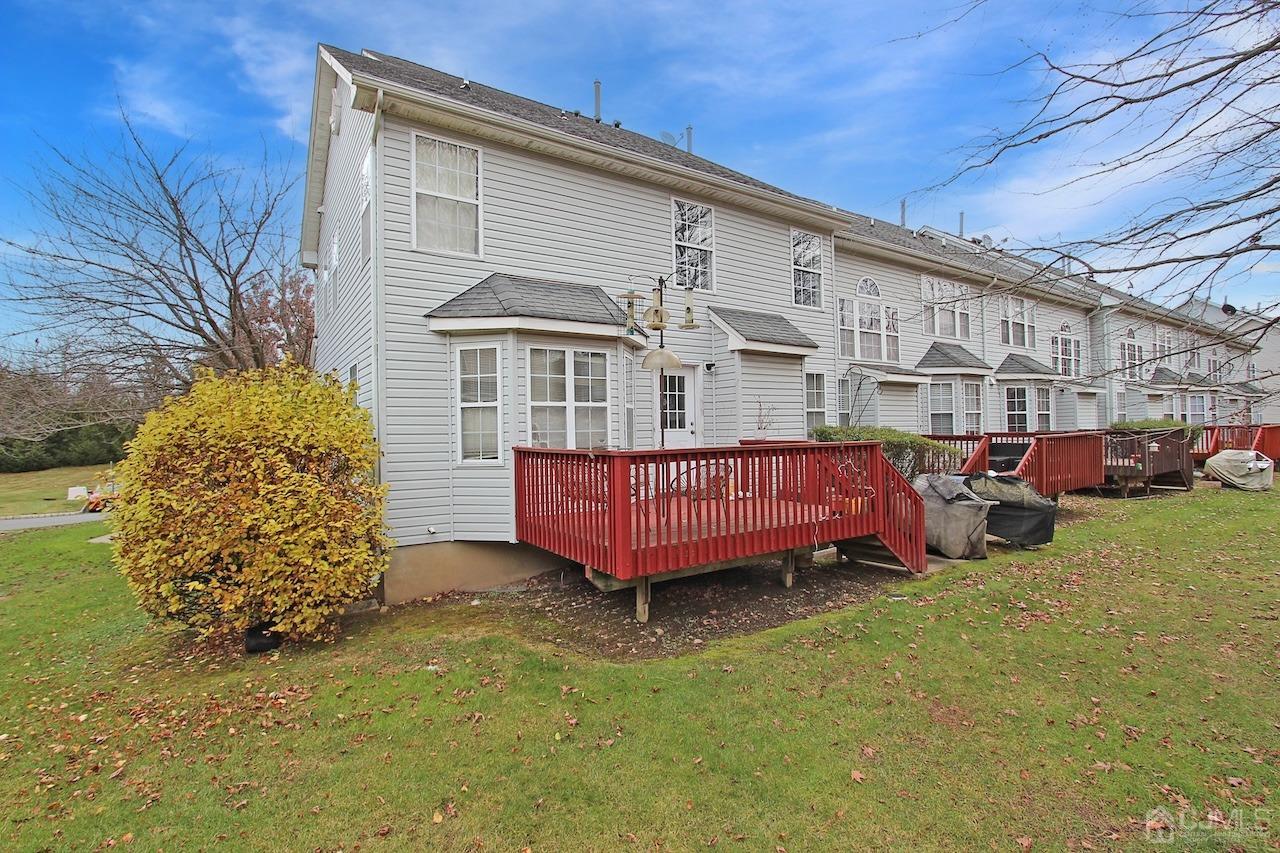 323 Hawthorne Road North Brunswick, NJ 08902 - Photo 28 of 29 a view of a house with a yard and sitting area