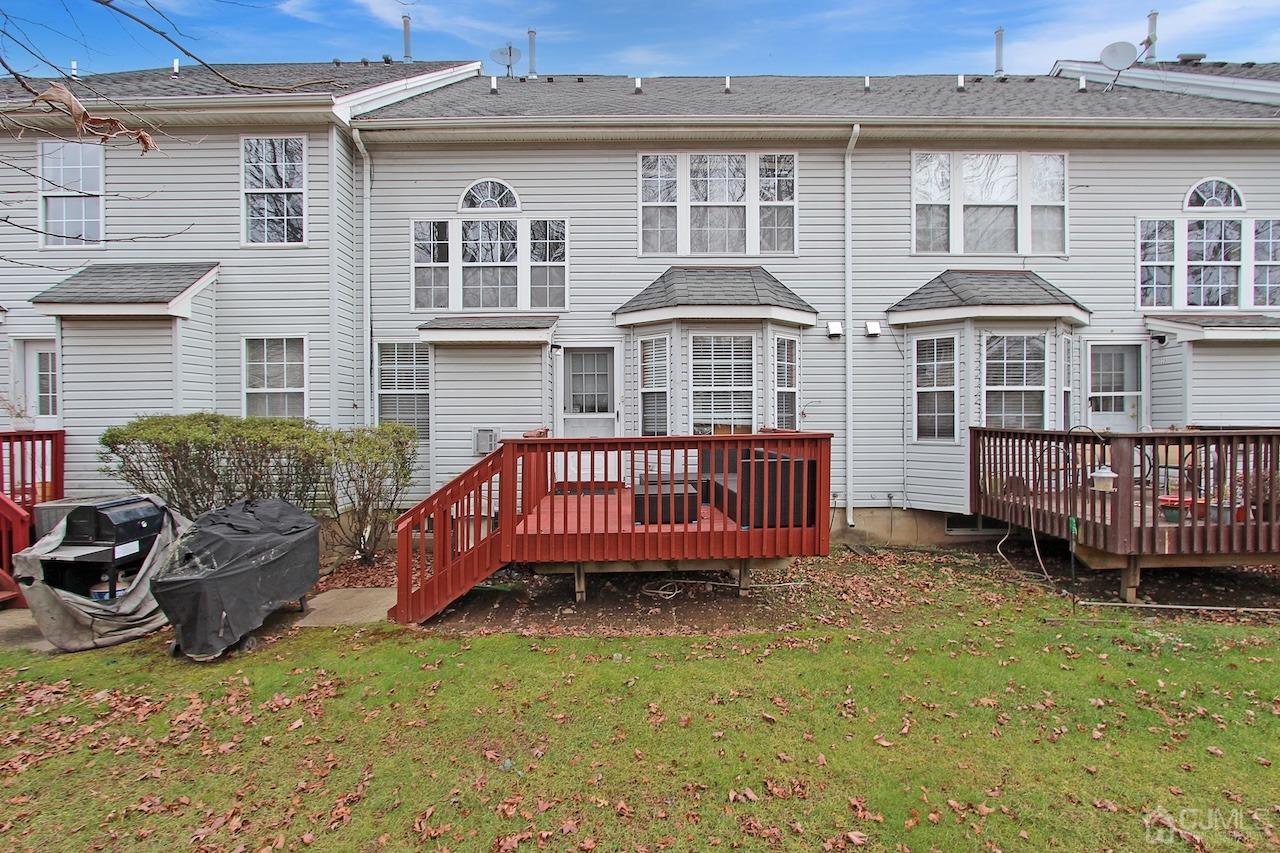 323 Hawthorne Road North Brunswick, NJ 08902 - Photo 29 of 29 a front view of a house with a garden and deck