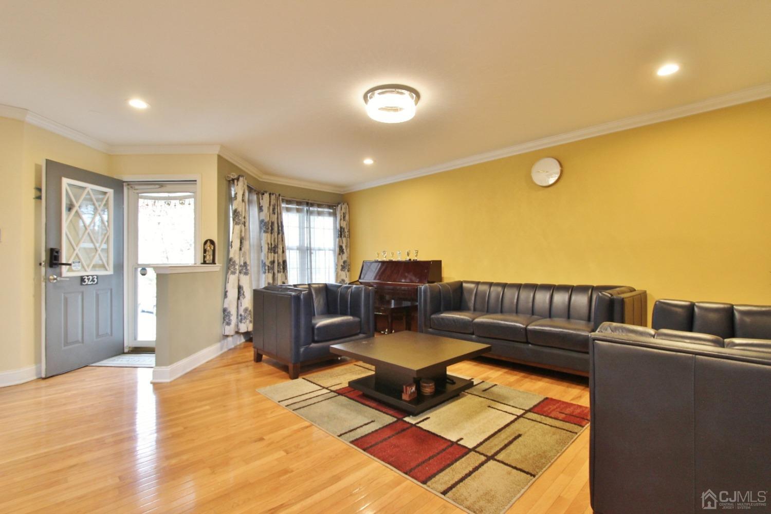 323 Hawthorne Road North Brunswick, NJ 08902 - Photo 4 of 29 a living room with furniture