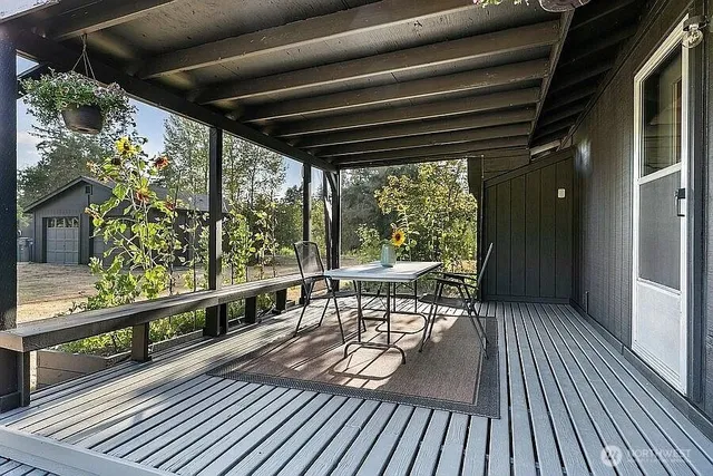 a view of a chairs on the roof deck
