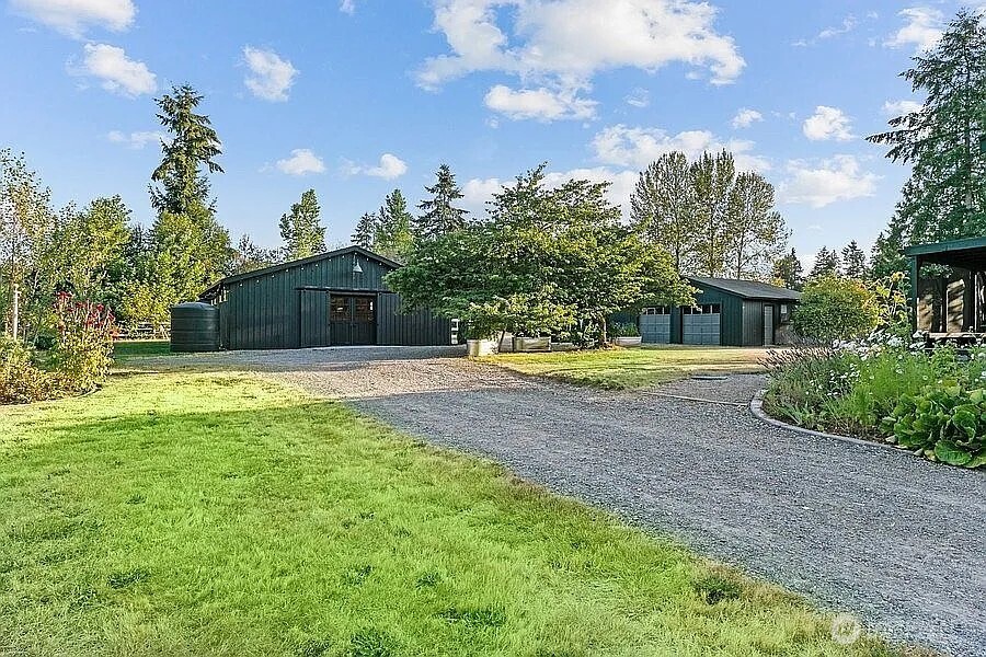 Undisclosed Address Redmond, WA 98052 - Photo 30 of 31 a swimming pool with outdoor seating and yard