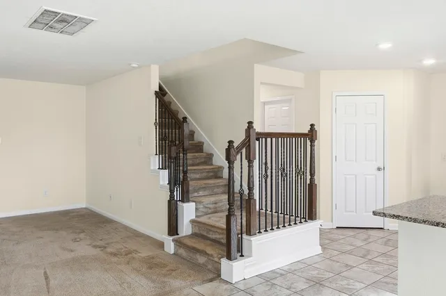 a view of a hallway with entryway