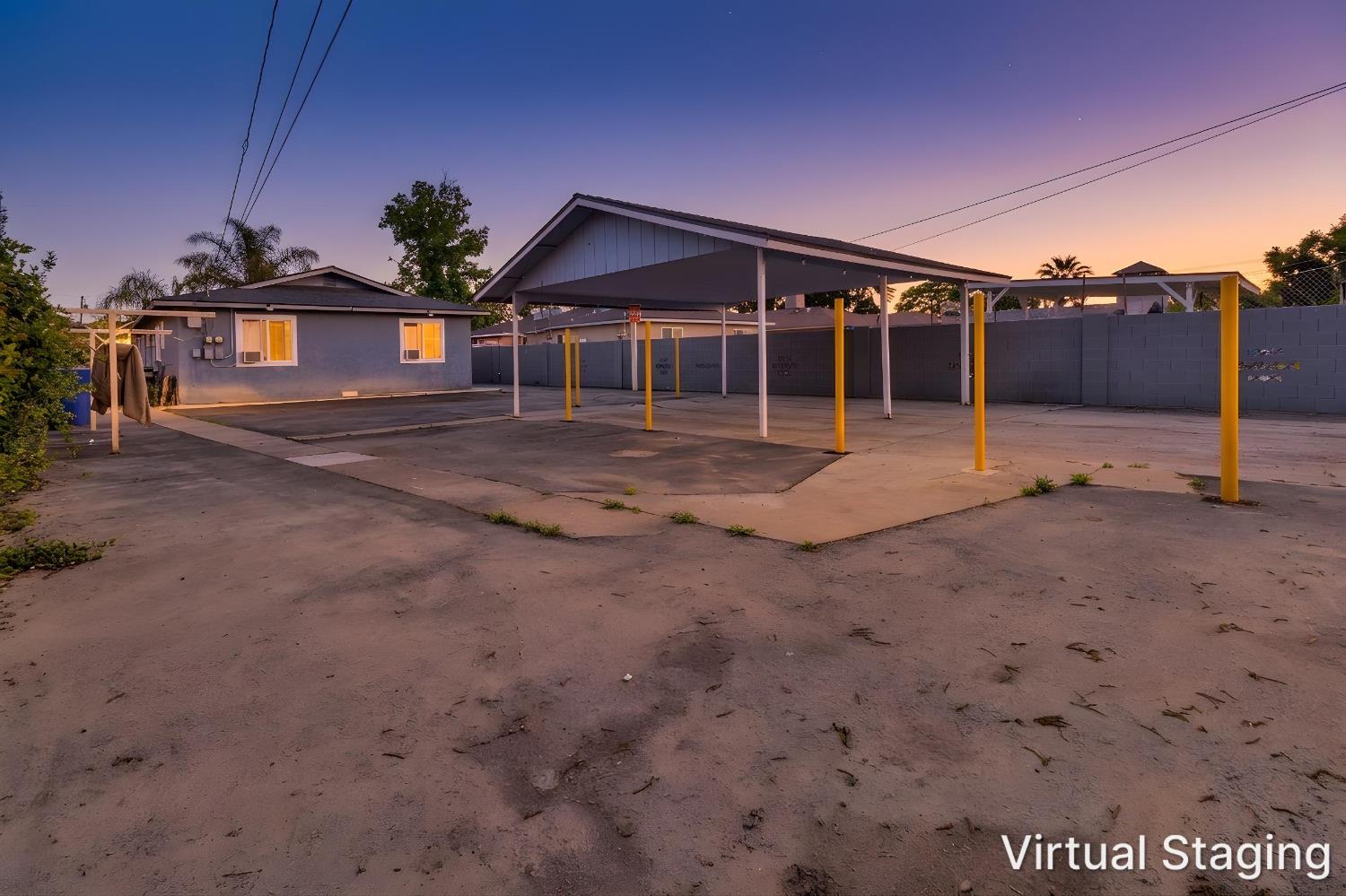 715 Faller Avenue Sanger, CA 93657 - Photo 11 of 40 a view of a house with a backyard