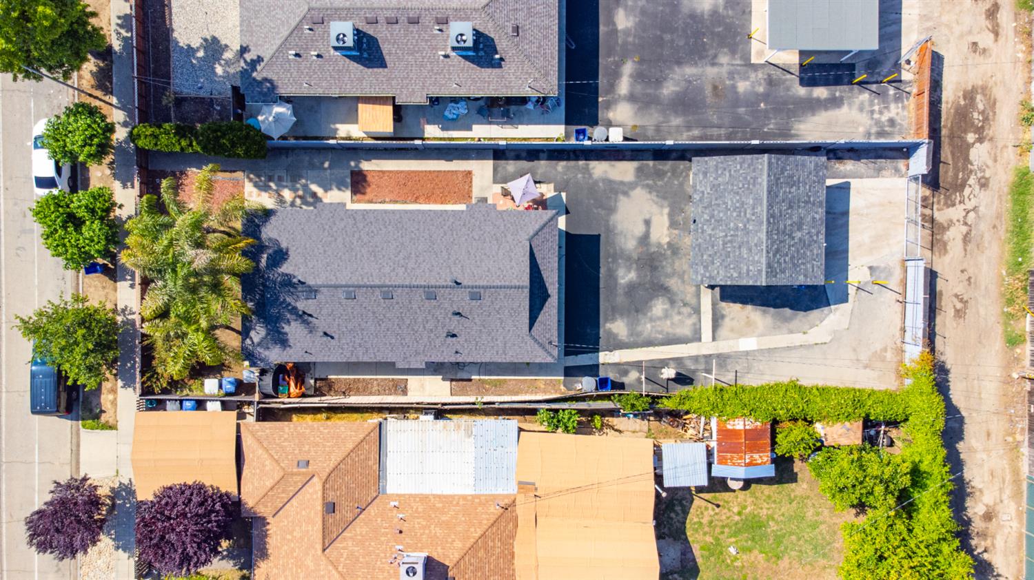 715 Faller Avenue Sanger, CA 93657 - Photo 13 of 40 an aerial view of a house with swimming pool