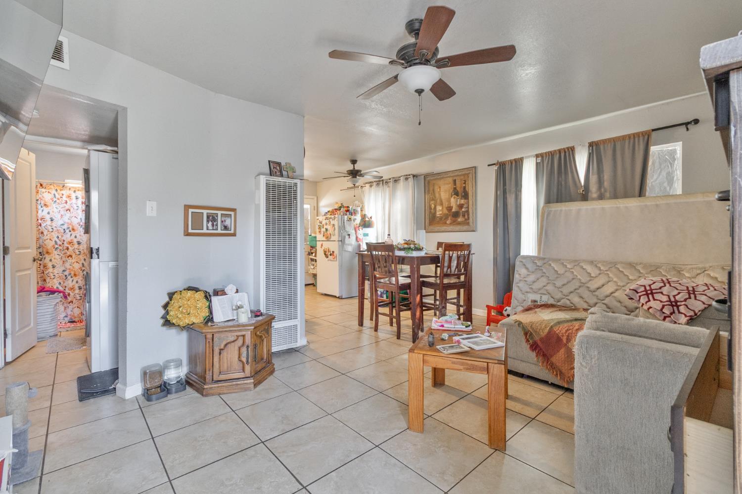 715 Faller Avenue Sanger, CA 93657 - Photo 19 of 40 a living room with furniture and white walls