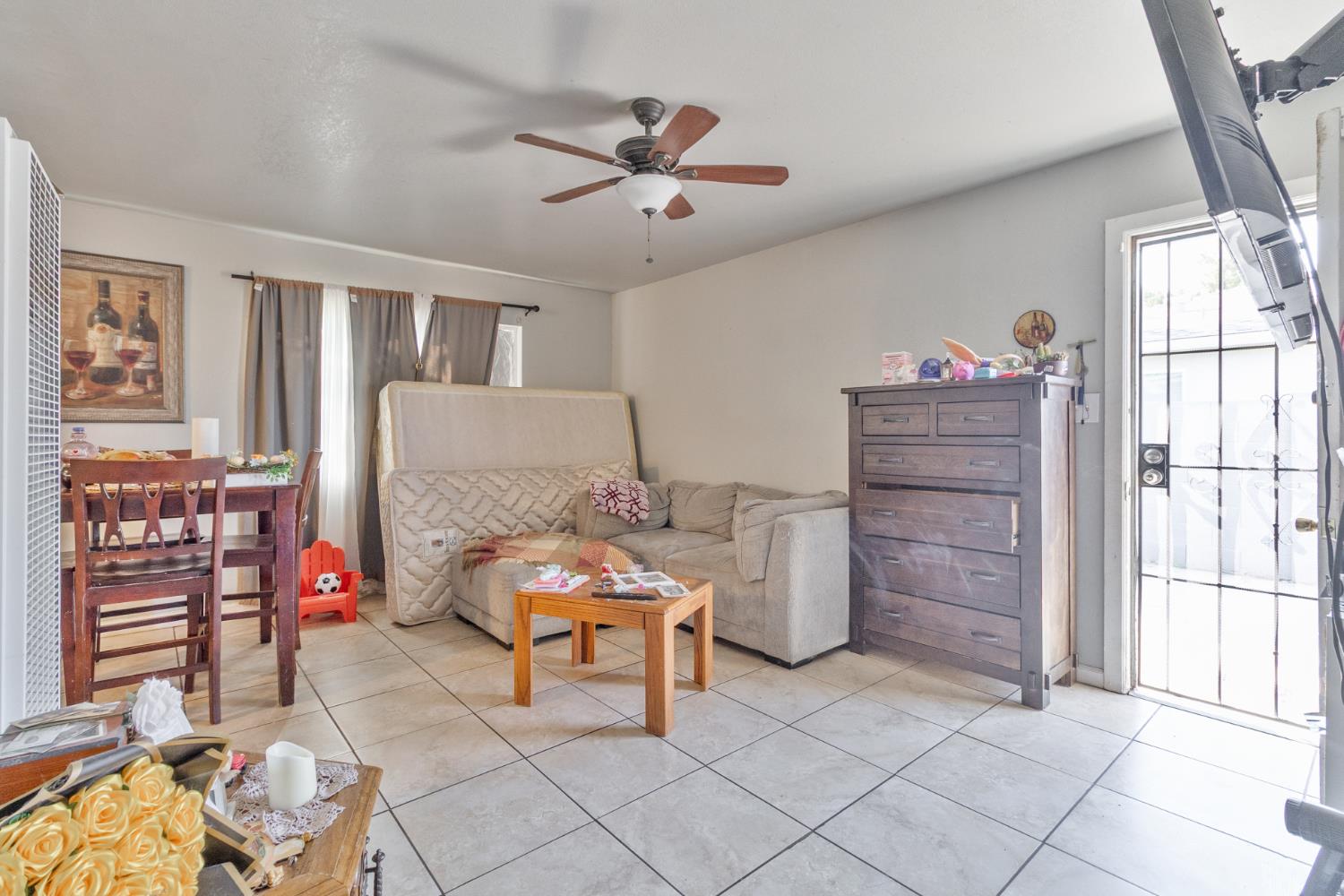 715 Faller Avenue Sanger, CA 93657 - Photo 22 of 40 a living room with furniture and a window