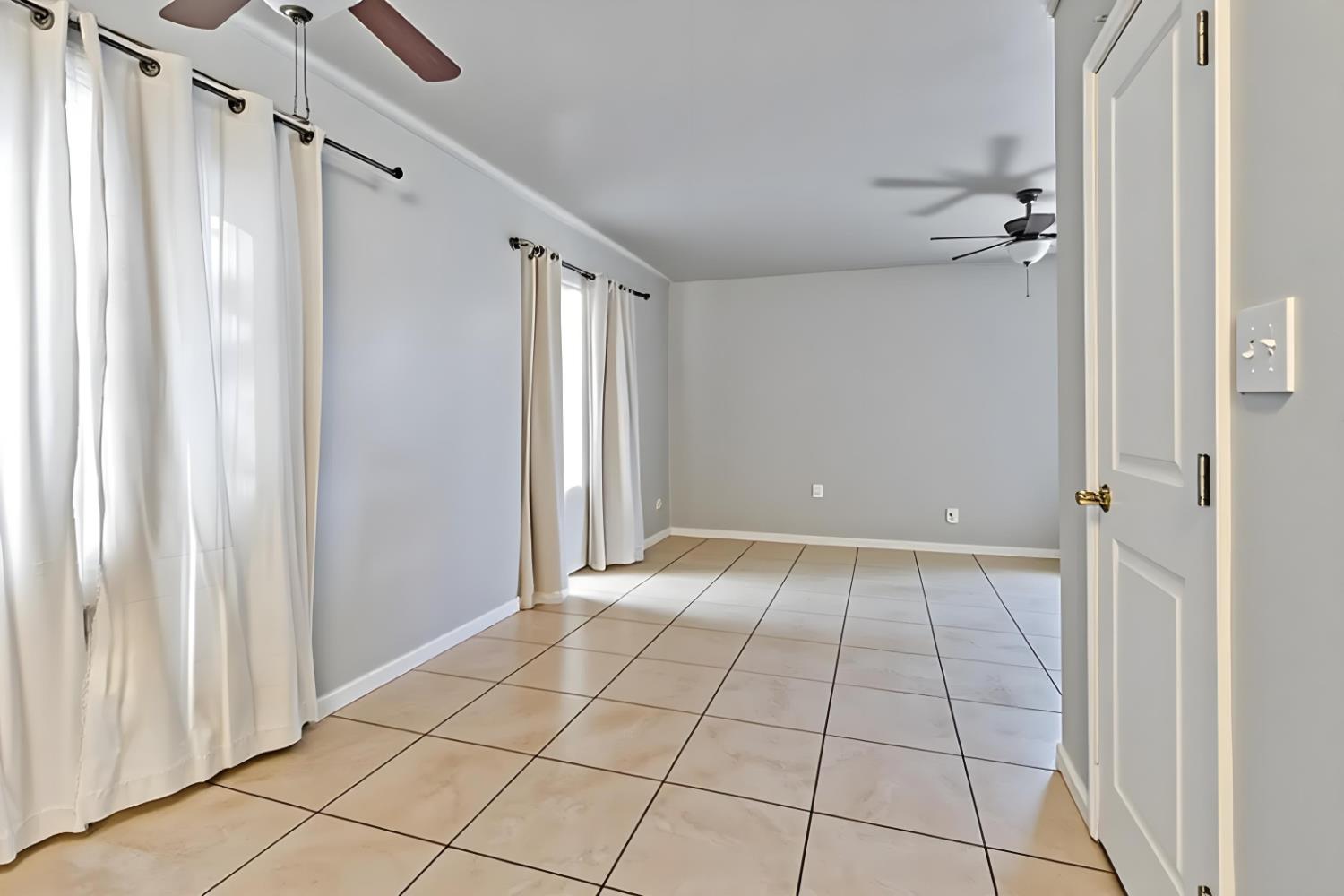 715 Faller Avenue Sanger, CA 93657 - Photo 24 of 40 a view of an empty room and window