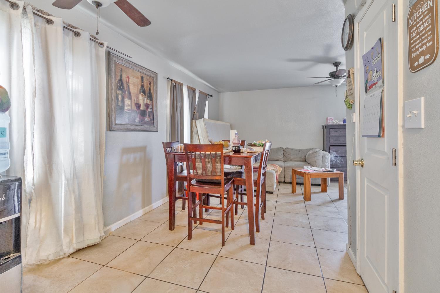 715 Faller Avenue Sanger, CA 93657 - Photo 26 of 40 a dining room with furniture and a window