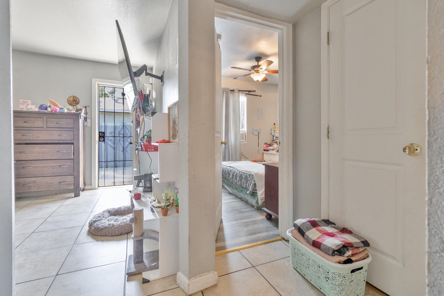 715 Faller Avenue Sanger, CA 93657 - Photo 31 of 40 a hallway with a view of living room