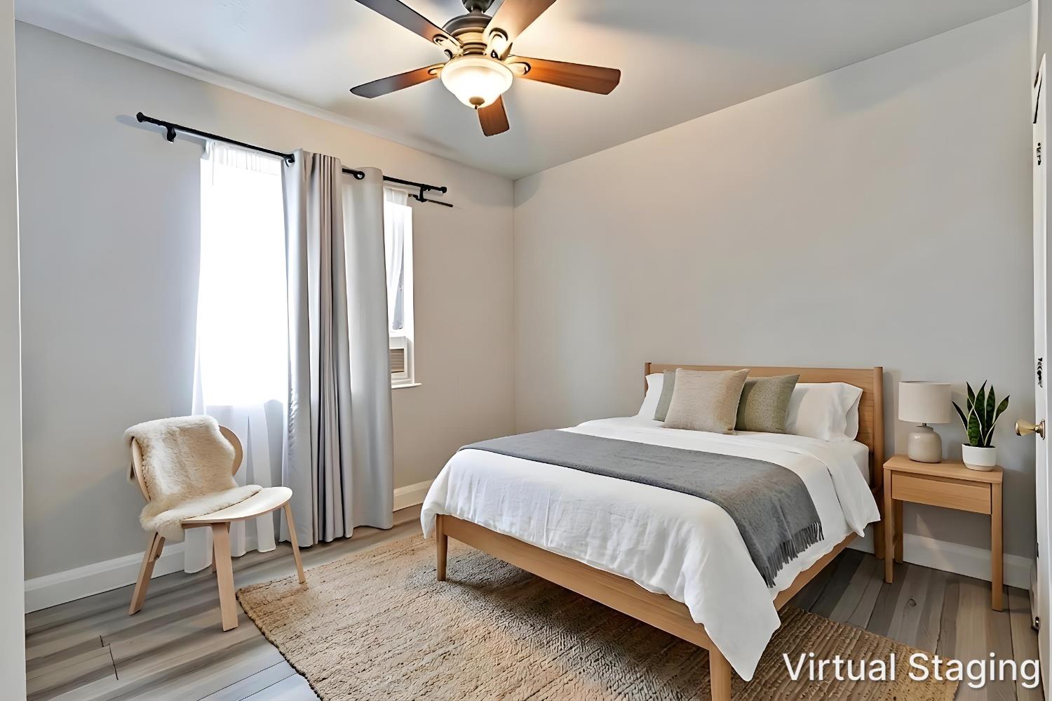 715 Faller Avenue Sanger, CA 93657 - Photo 33 of 40 a bedroom with a bed and a chair