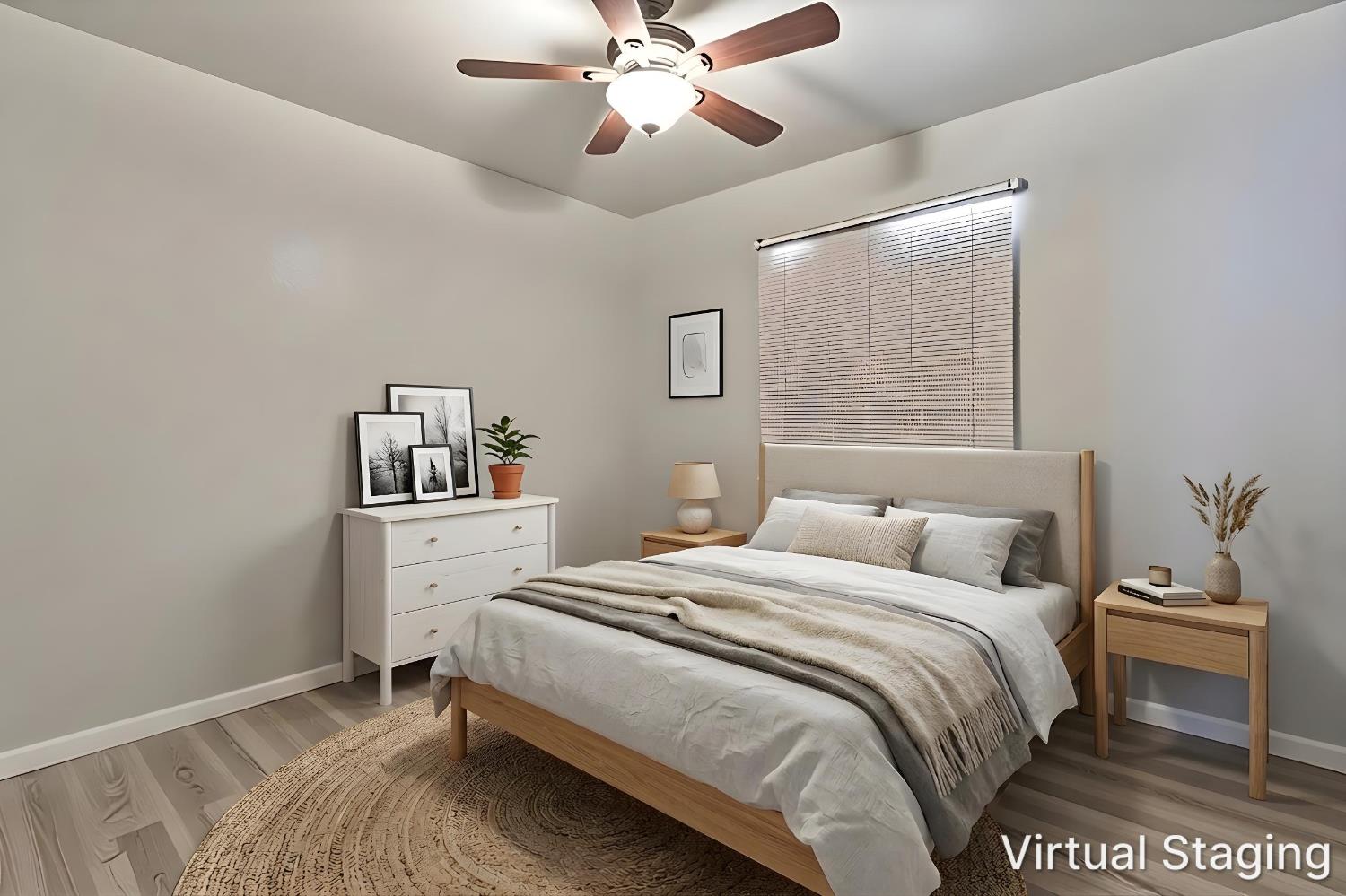 715 Faller Avenue Sanger, CA 93657 - Photo 36 of 40 a bedroom with a bed and a chandelier