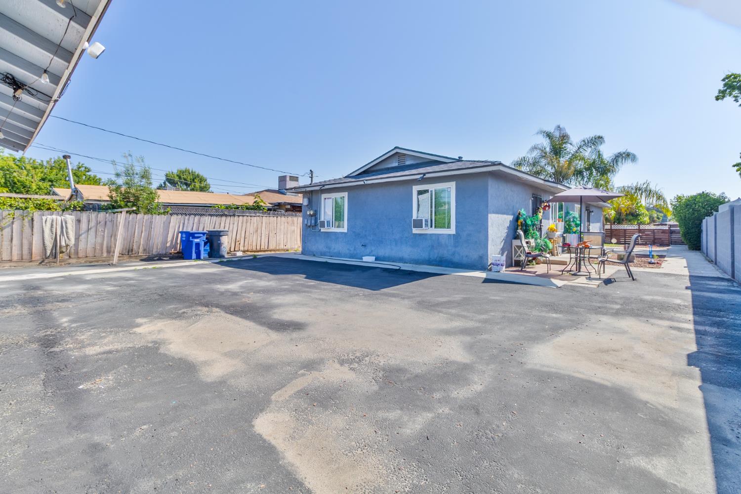 715 Faller Avenue Sanger, CA 93657 - Photo 7 of 40 a view of a house with a patio