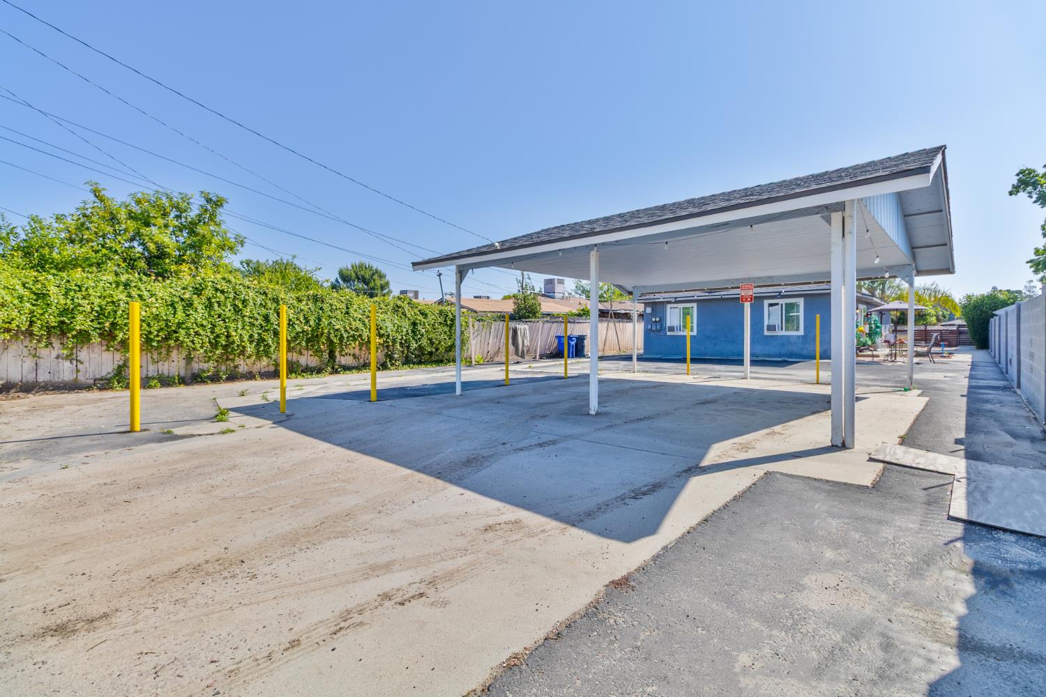 715 Faller Avenue Sanger, CA 93657 - Photo 10 of 40 a view of a backyard with a garden and plants
