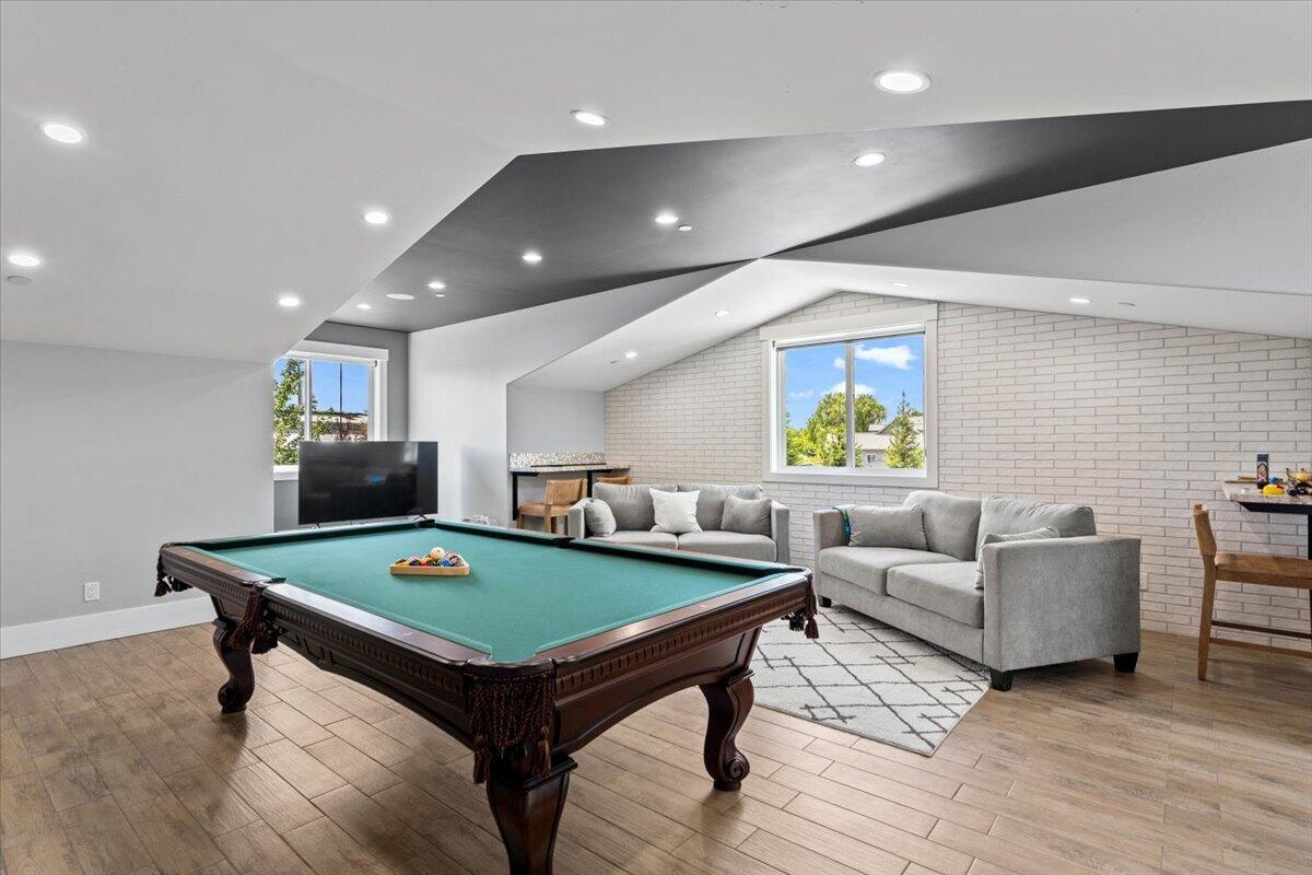 19580 Mockingbird Lane Redding, CA 96002 - Photo 105 of 216 a living room with furniture pool table and a wooden floor