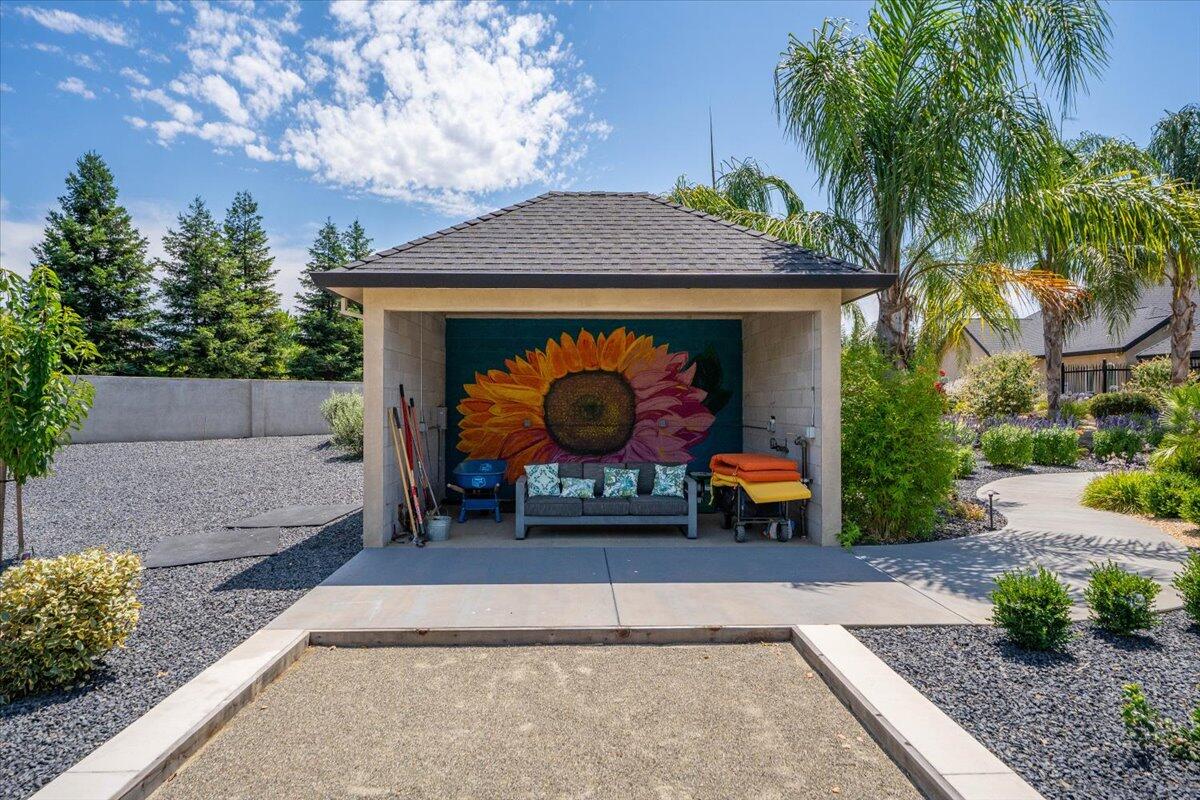 19580 Mockingbird Lane Redding, CA 96002 - Photo 142 of 216 a bench sitting in front of a house
