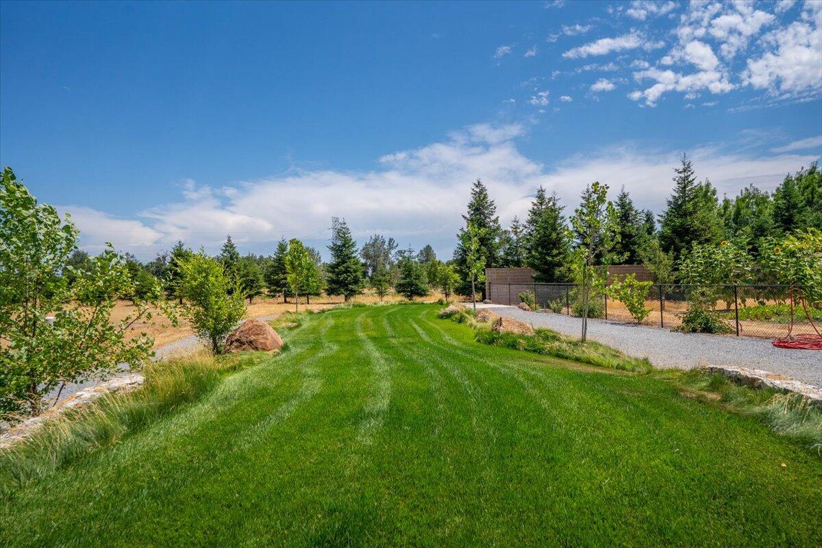 19580 Mockingbird Lane Redding, CA 96002 - Photo 150 of 216 a view of a lake with houses in the back