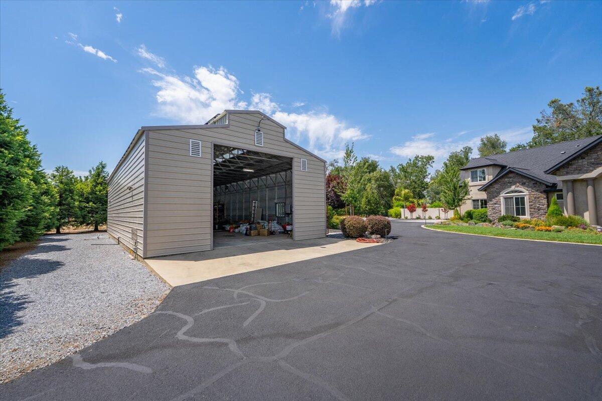 19580 Mockingbird Lane Redding, CA 96002 - Photo 28 of 216 a view of a house with a garage and a garage