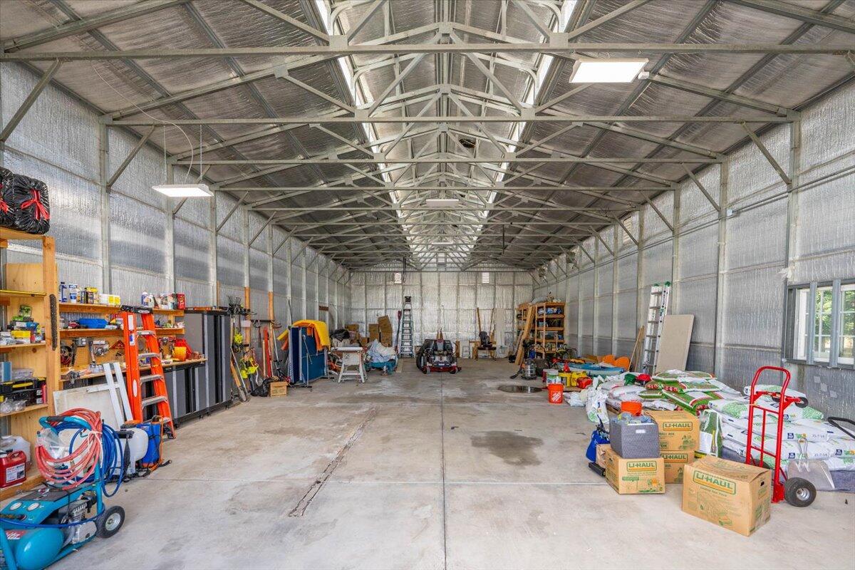 19580 Mockingbird Lane Redding, CA 96002 - Photo 29 of 216 a view of a garage with a lot of stuff