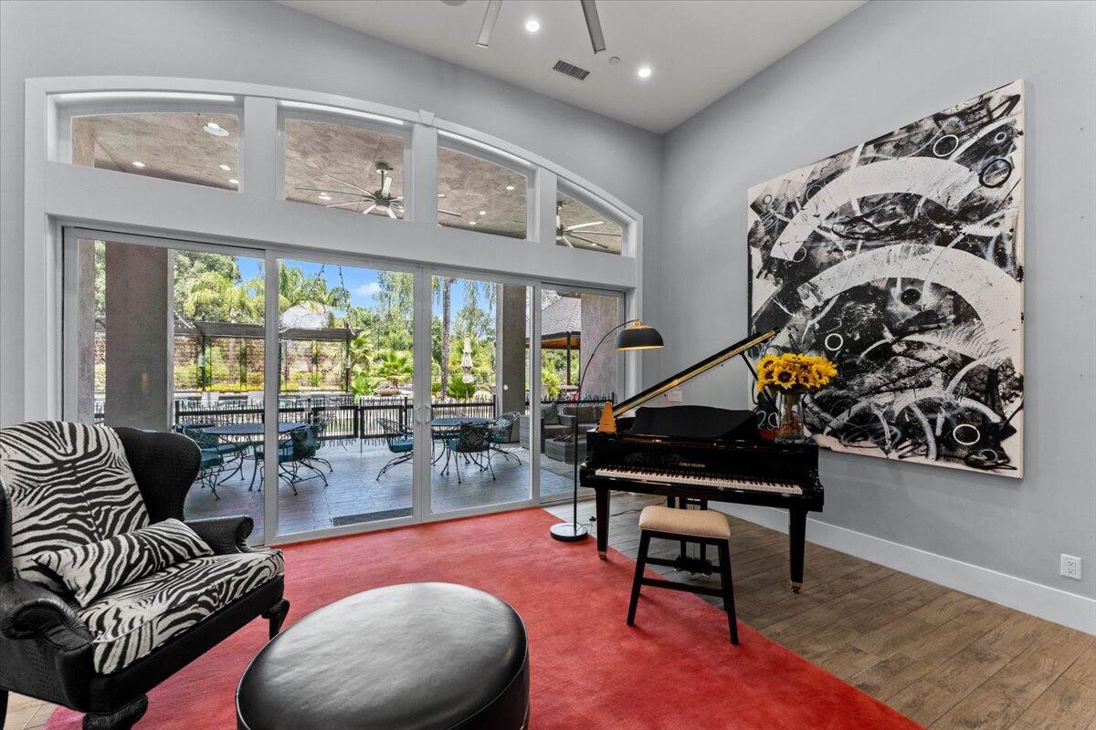 19580 Mockingbird Lane Redding, CA 96002 - Photo 77 of 216 a living room with furniture and a large window