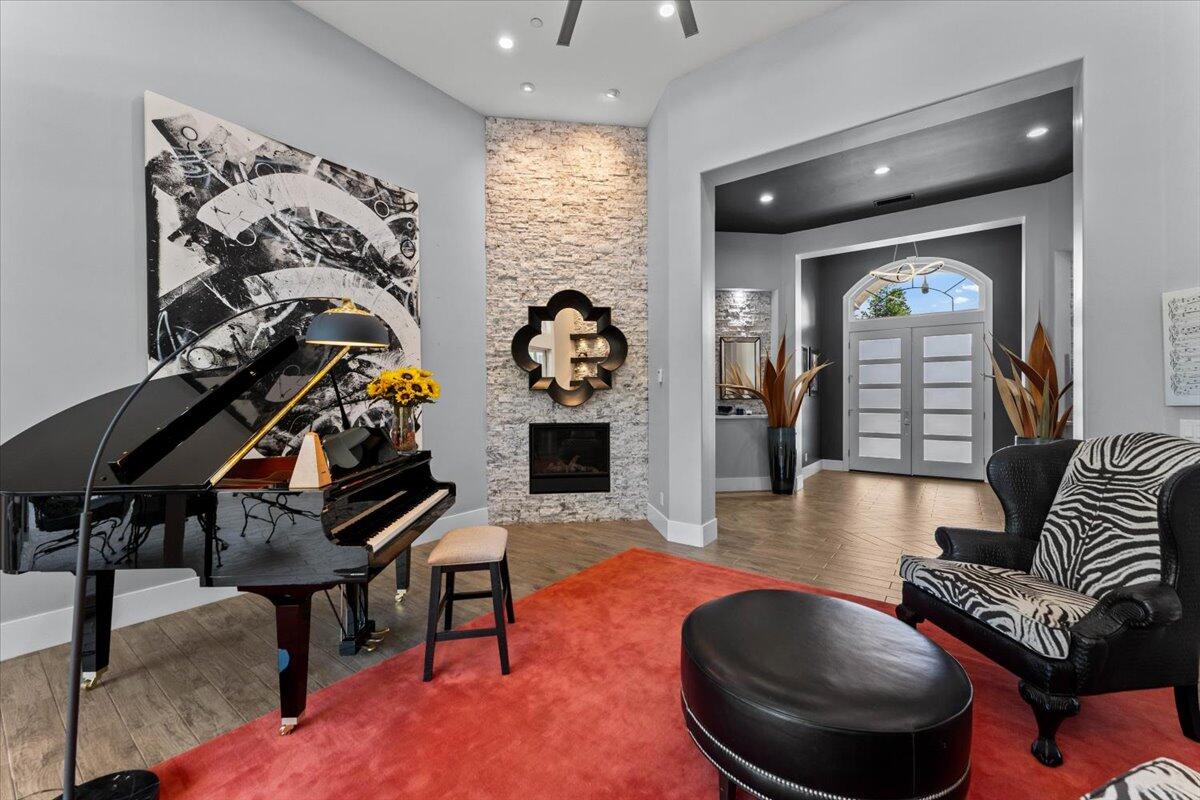 19580 Mockingbird Lane Redding, CA 96002 - Photo 79 of 216 a living room with furniture and a wooden floor
