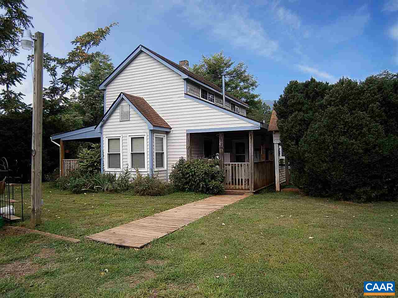 4280 Slam Gate Road Crozet, VA 22932 - Photo 3 of 20 a front view of a house with yard and green space