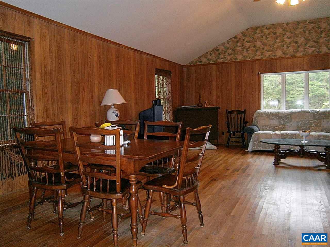4280 Slam Gate Road Crozet, VA 22932 - Photo 8 of 20 a view of a dining room with furniture window and outside view