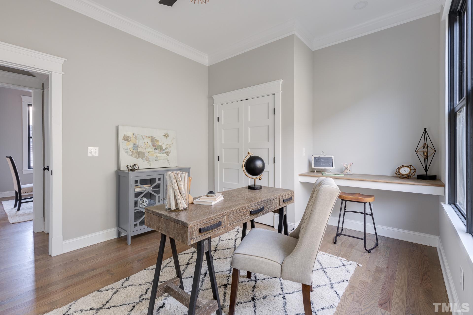 1010 Onslow Street Durham, NC 27705 - Photo 15 of 30 a view of a dining room with furniture and wooden floor