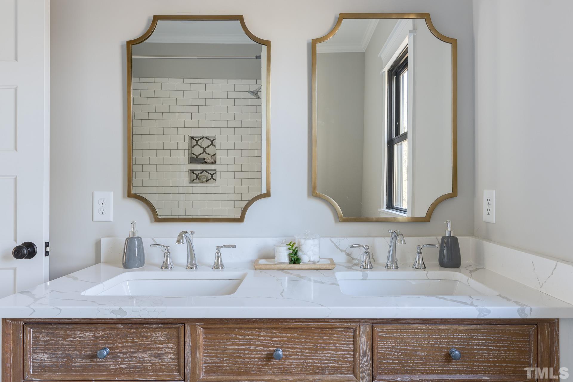 1010 Onslow Street Durham, NC 27705 - Photo 25 of 30 a bathroom with a granite countertop sink and a mirror