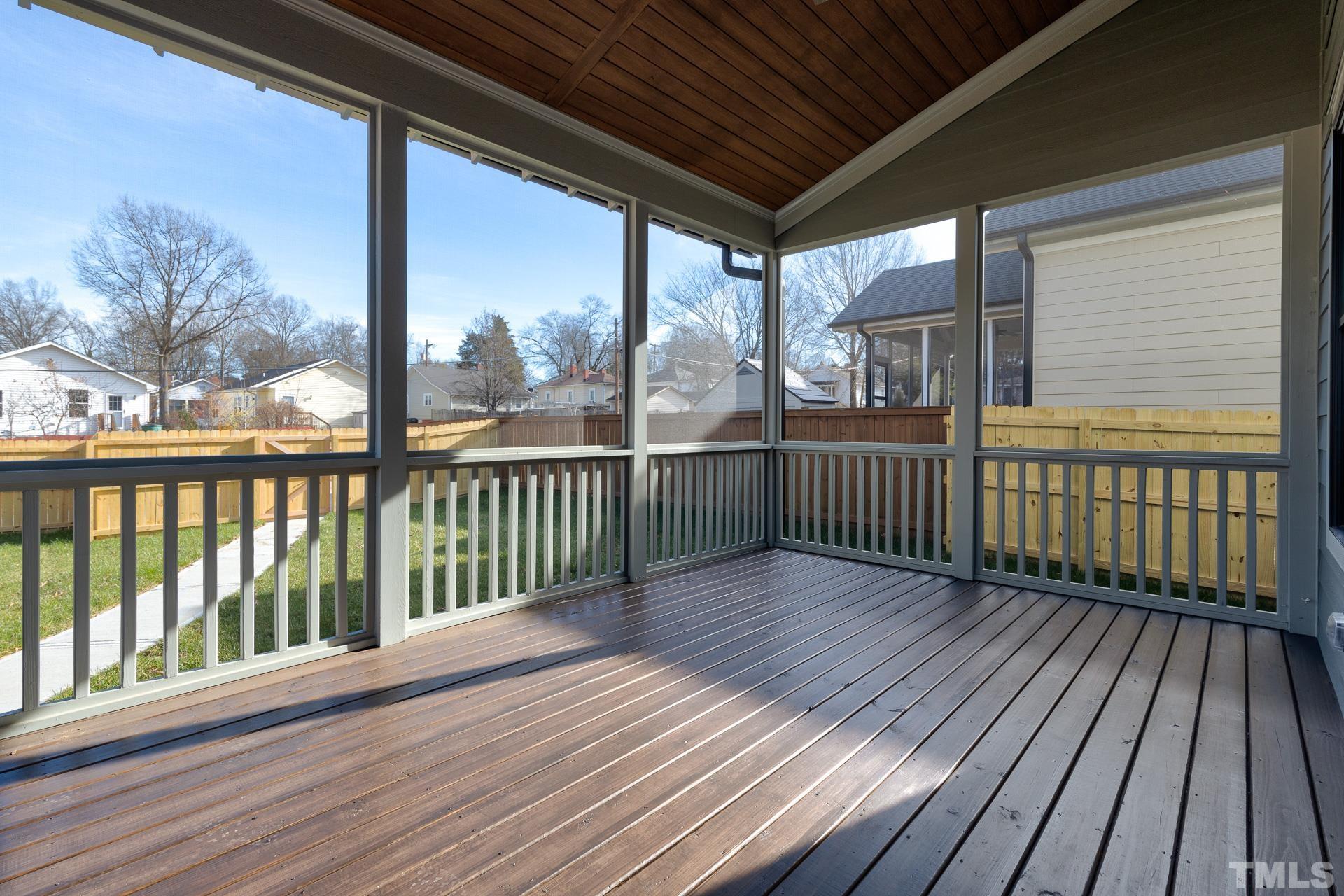 1010 Onslow Street Durham, NC 27705 - Photo 27 of 30 a view of wooden deck with a floor to ceiling window