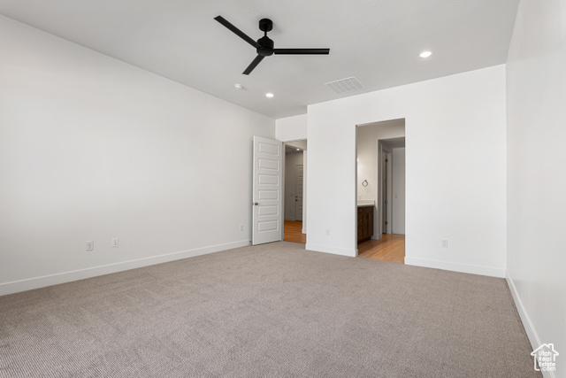 549 North Legend Circle, Unit C/466 Mapleton, UT 84664 - Photo 20 of 39 Unfurnished bedroom featuring light colored carpet, recessed lighting, ensuite bathroom, and a ceiling fan