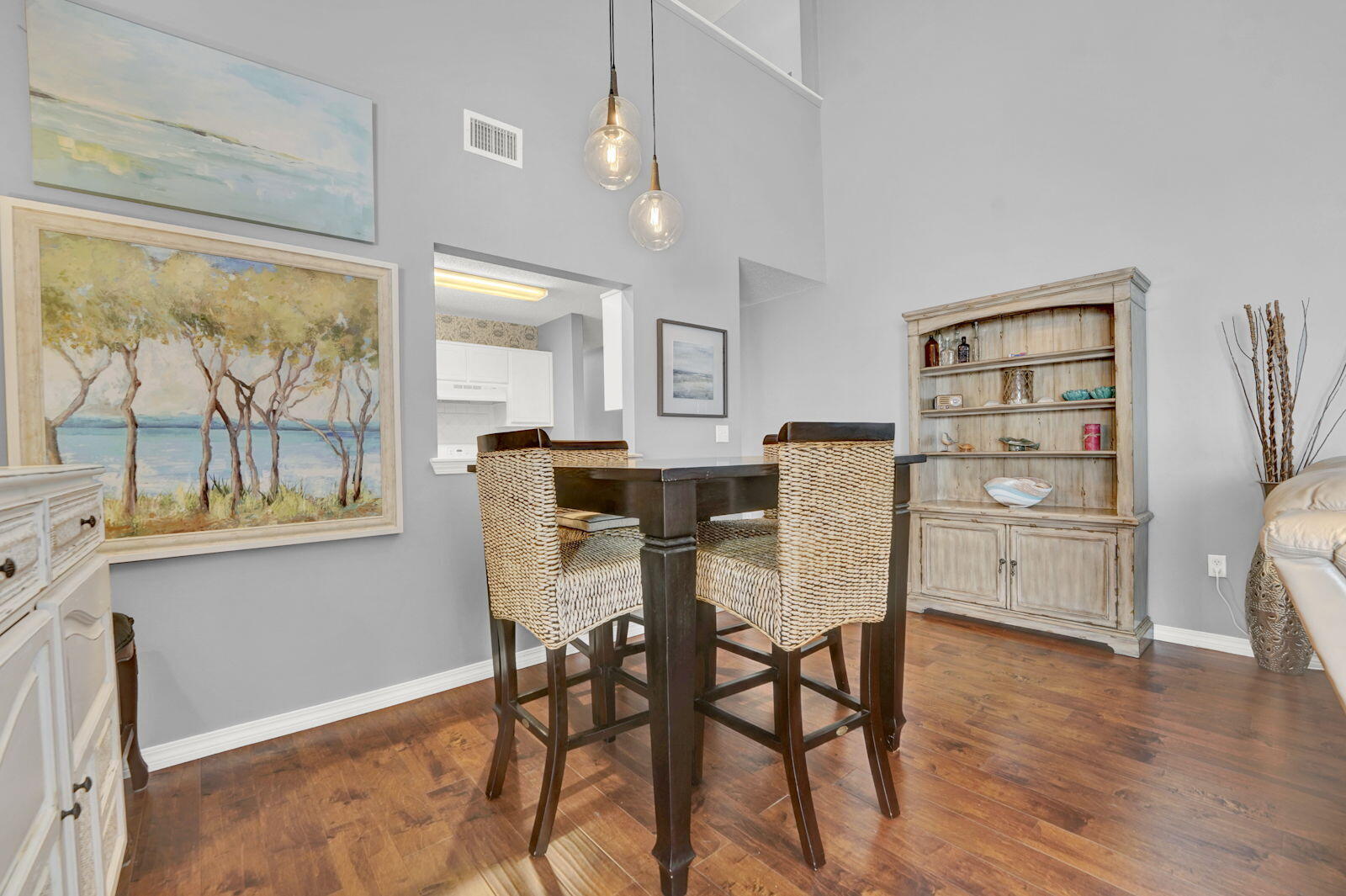 231 Vía Largo, Unit 39B Santa Rosa Beach, FL 32459 - Photo 2 of 50 a view of a dining room with furniture window and wooden floor