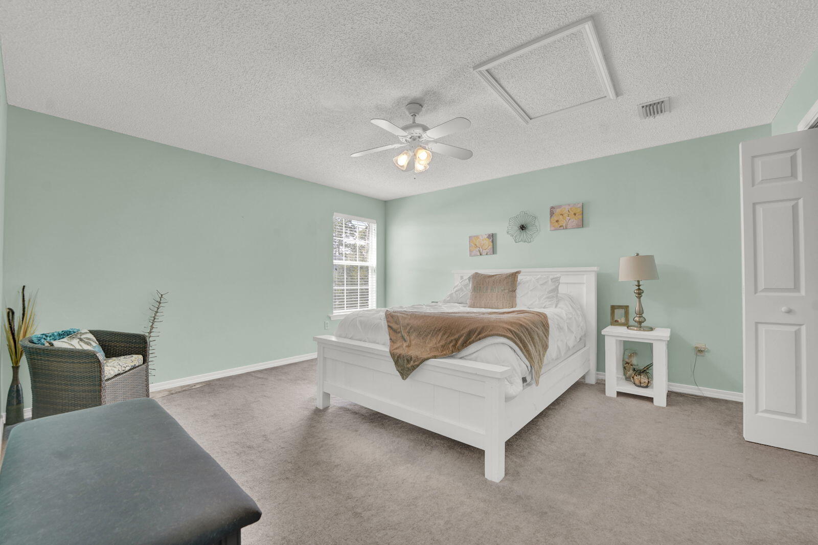 231 Vía Largo, Unit 39B Santa Rosa Beach, FL 32459 - Photo 22 of 50 a bedroom with a bed and window