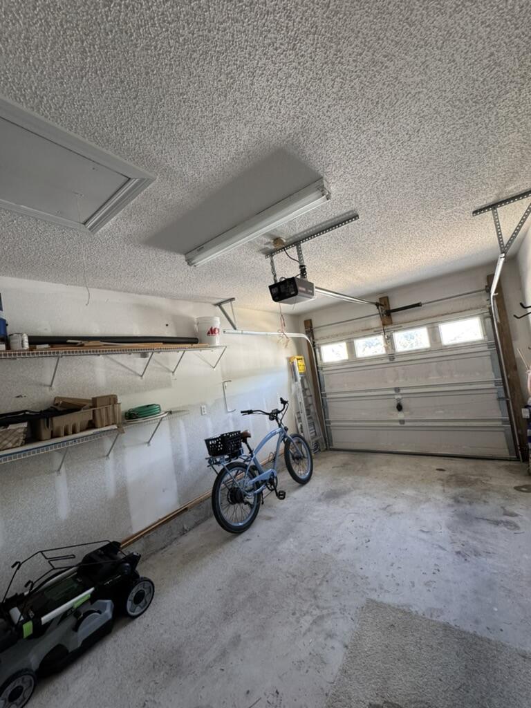 231 Vía Largo, Unit 39B Santa Rosa Beach, FL 32459 - Photo 25 of 50 a view of parking garage with cars