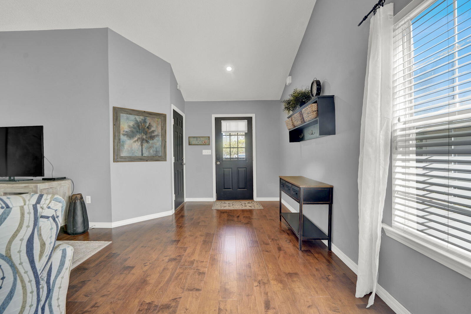 231 Vía Largo, Unit 39B Santa Rosa Beach, FL 32459 - Photo 4 of 50 a view of livingroom with furniture and flat screen tv