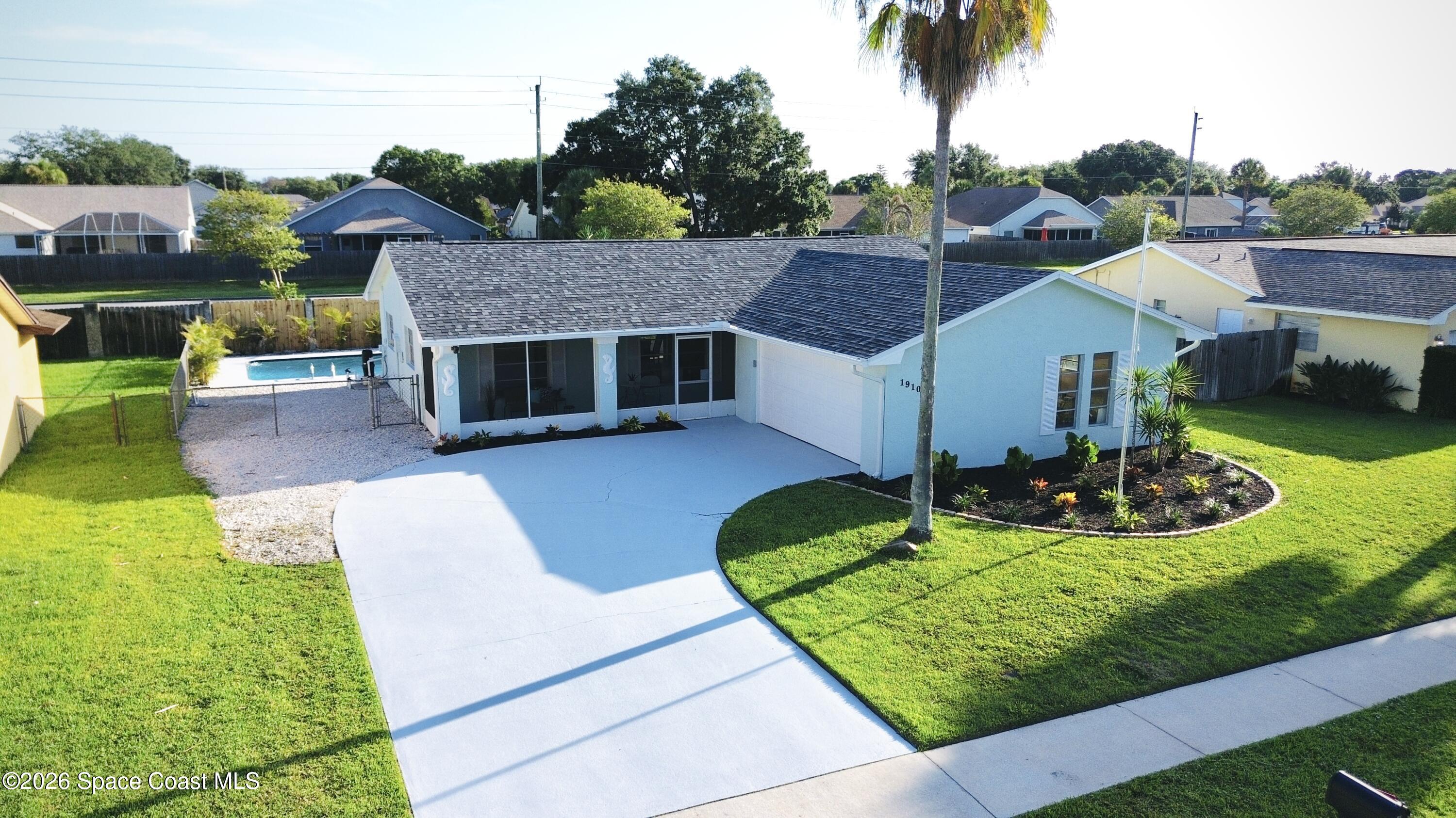1910 Tallridge Road Melbourne, FL 32935 - Photo 1 of 34 Front of house