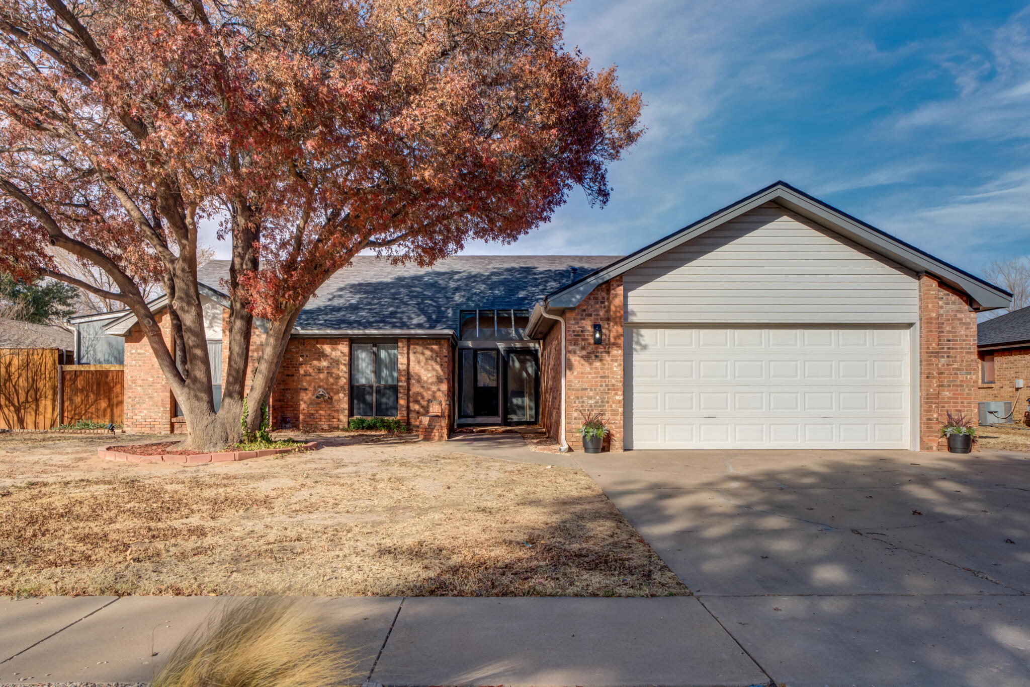 3602 101st Street Lubbock, TX 79423 - Photo 1 of 51 a view of a house with a outdoor space