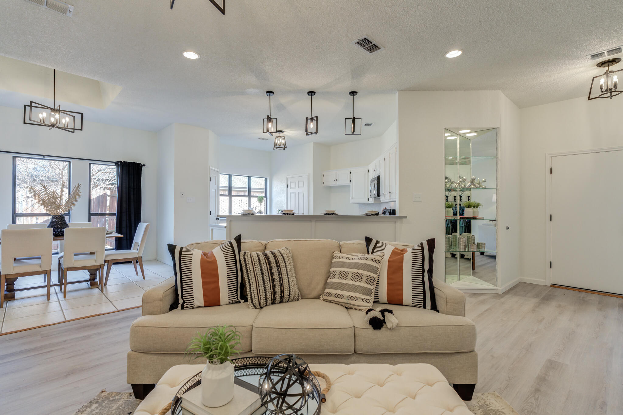 3602 101st Street Lubbock, TX 79423 - Photo 12 of 51 a living room with furniture and wooden floor